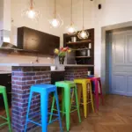 Spacious shared lounge and seating area inside the 8-bed mixed dormitory room at Choco Home and Hostel in Cluj-Napoca.