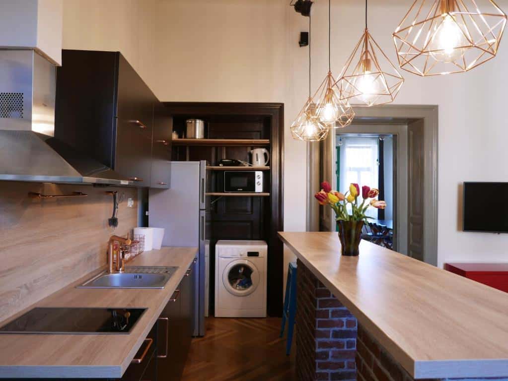 Fully equipped shared kitchen at Choco Home & Hostel